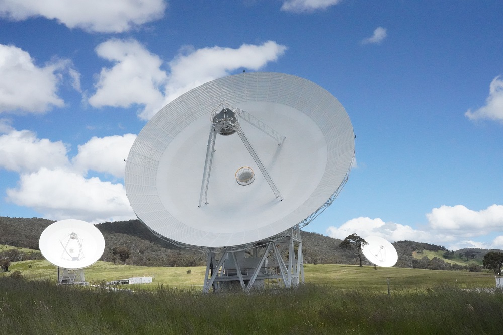DSS 36 in the foreground, with DSS 35 on the left and DSS 34 on the right - each tracking data from different missions at the CDSCC. Credit: R. Mandow. 